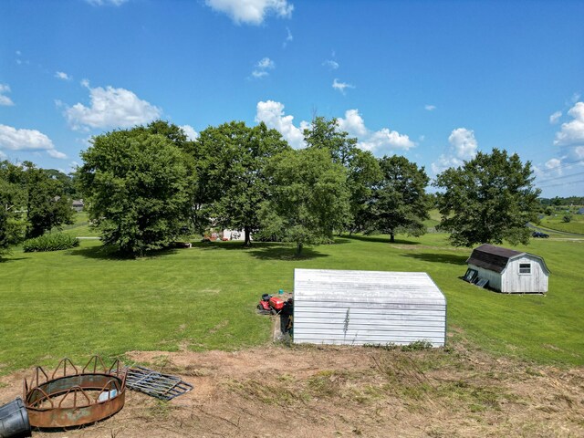 1843 Clara Mathis Rd, Spring Hill, TN 37174 - view of green lawn with a shed and view of wooded area