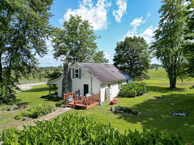 1843 Clara Mathis Rd, Spring Hill, TN 37174 - back of house with a deck, a chimney, and a yard