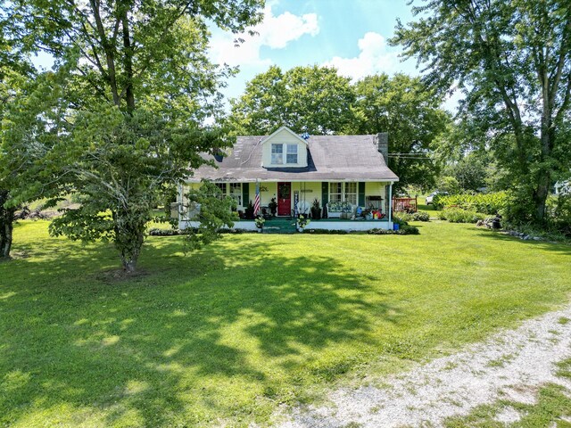 1843 Clara Mathis Rd, Spring Hill, TN 37174 - cape cod house featuring a porch and a front yard