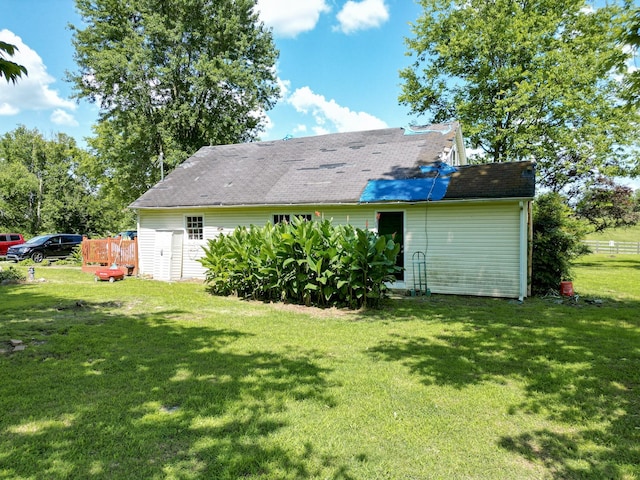 1843 Clara Mathis Rd, Spring Hill, TN 37174 - back of property with a yard and roof with shingles