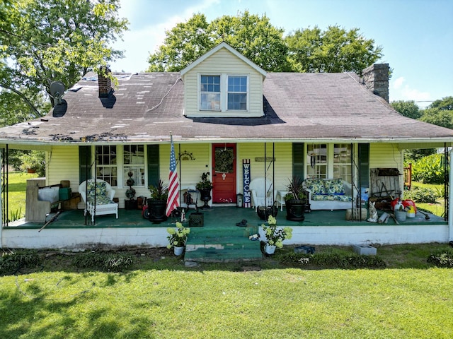 1843 Clara Mathis Rd, Spring Hill, TN 37174 - country-style home with a chimney, a porch, and a front lawn