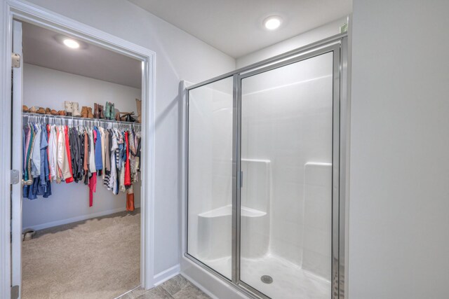 207 Welara St, Murfreesboro, TN 37129 - bathroom with a stall shower and a spacious closet