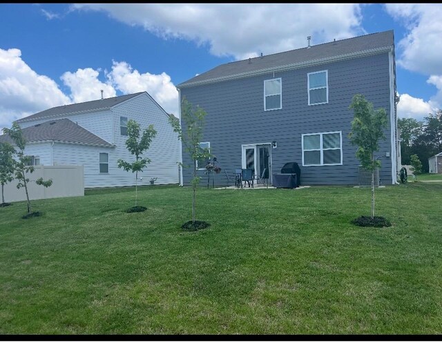 207 Welara St, Murfreesboro, TN 37129 - back of property featuring a yard
