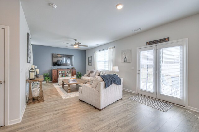 207 Welara St, Murfreesboro, TN 37129 - living room with a ceiling fan and light wood-style flooring
