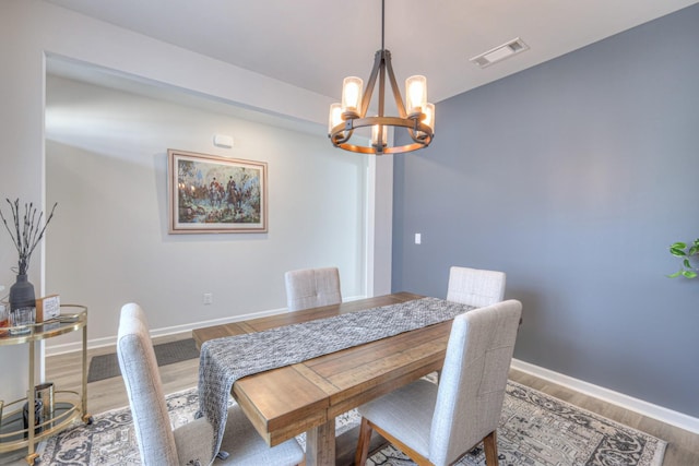 207 Welara St, Murfreesboro, TN 37129 - dining area featuring a chandelier and wood finished floors