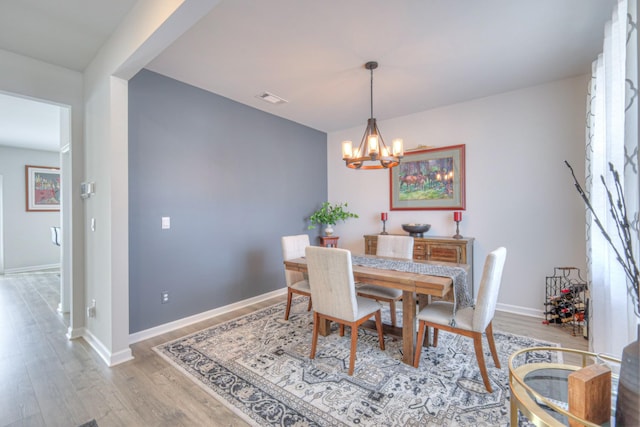 207 Welara St, Murfreesboro, TN 37129 - dining room with a chandelier and wood finished floors