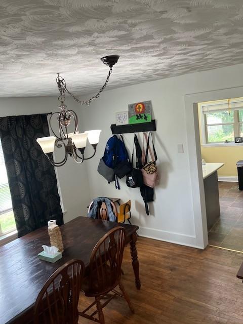 117 Willow St N, Cowan, TN 37318 - dining space with a chandelier and wood finished floors