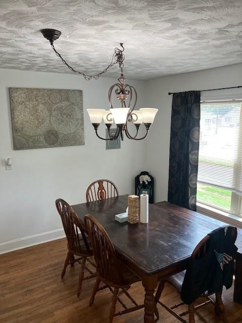 117 Willow St N, Cowan, TN 37318 - dining space featuring a chandelier, wood finished floors, and a textured ceiling