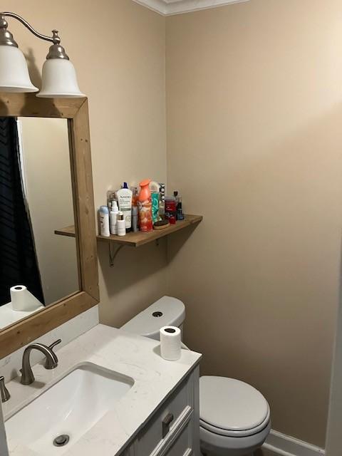 117 Willow St N, Cowan, TN 37318 - half bath featuring vanity and ornamental molding