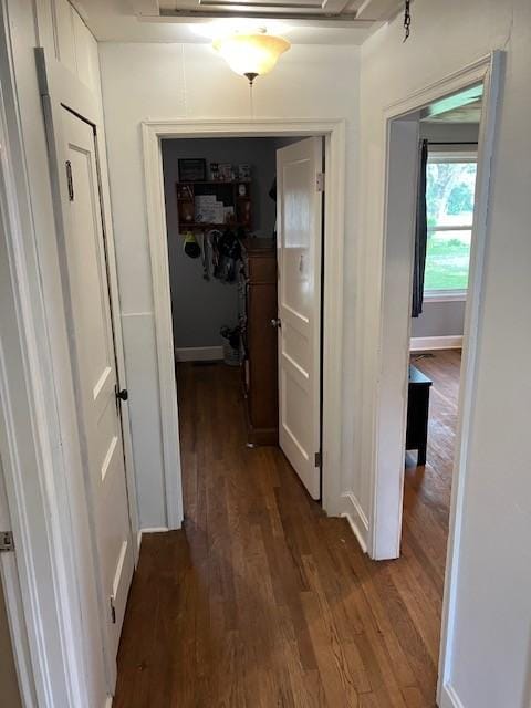 117 Willow St N, Cowan, TN 37318 - hallway with dark wood finished floors and attic access