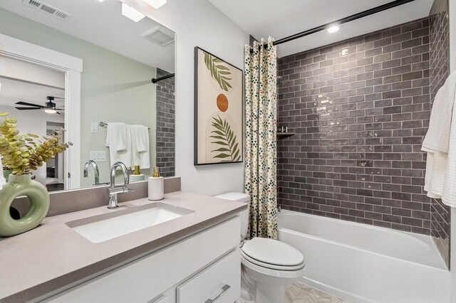 7405 Leelee Dr, Franklin, TN 37064 - bathroom with shower / bath combo, vanity, and ceiling fan