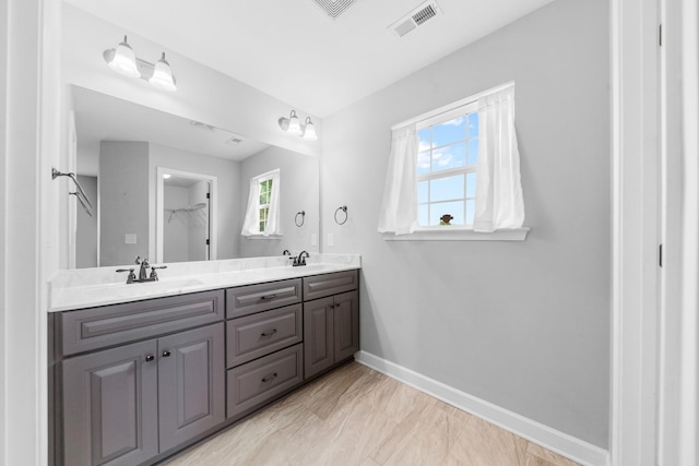 109 Tindell Ln, Columbia, TN 38401 - bathroom featuring double vanity and baseboards