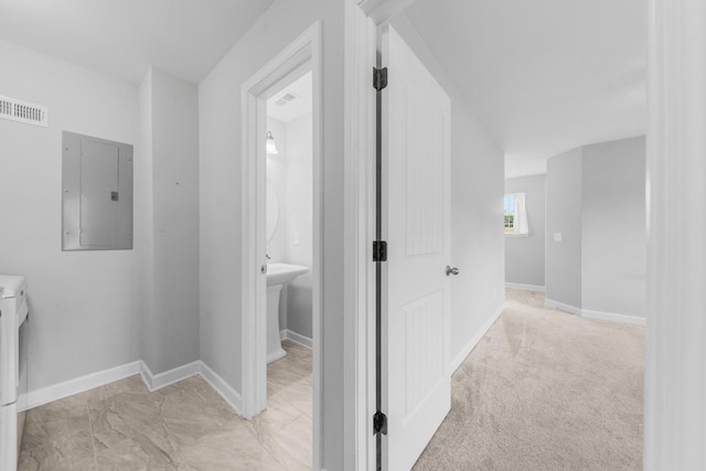 109 Tindell Ln, Columbia, TN 38401 - corridor with electric panel and washer / dryer