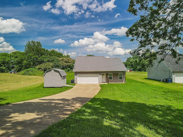 109 Tindell Ln, Columbia, TN 38401 - view of front facade with a front lawn, driveway, an attached garage, and a metal roof