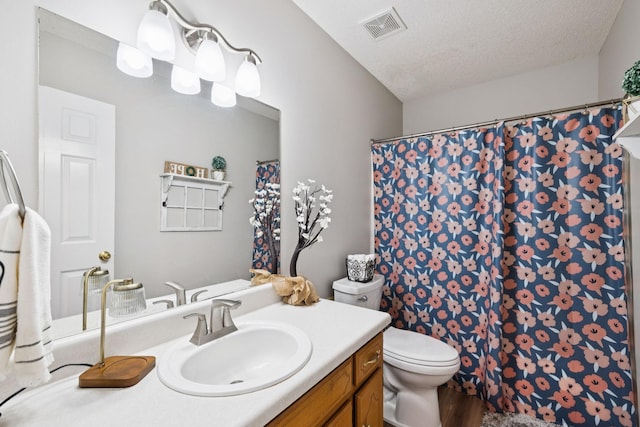3114 Penny Ln, Murfreesboro, TN 37130 - full bathroom with vanity, wood finished floors, curtained shower, and a textured ceiling