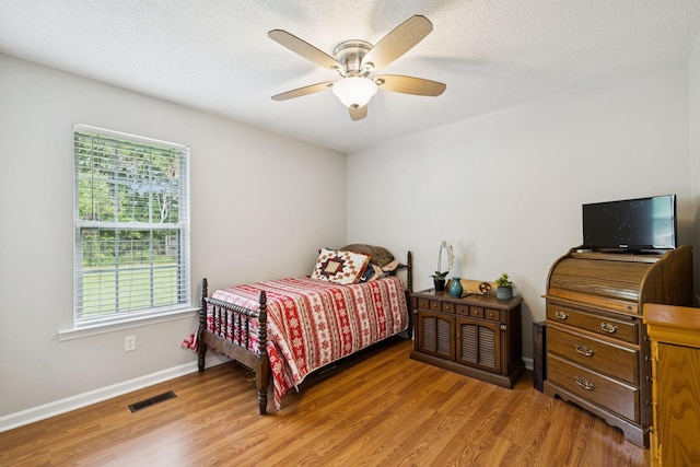 3114 Penny Ln, Murfreesboro, TN 37130 - bedroom featuring multiple windows, wood finished floors, and a ceiling fan
