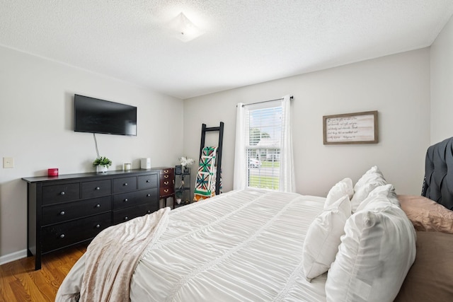 3114 Penny Ln, Murfreesboro, TN 37130 - bedroom with wood finished floors and a textured ceiling