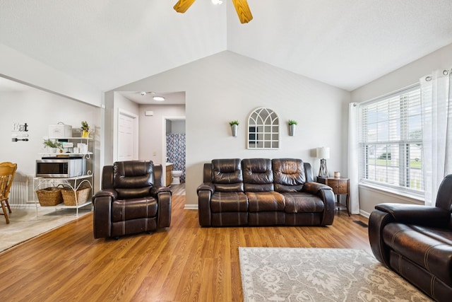 3114 Penny Ln, Murfreesboro, TN 37130 - living area with lofted ceiling, wood finished floors, and a ceiling fan