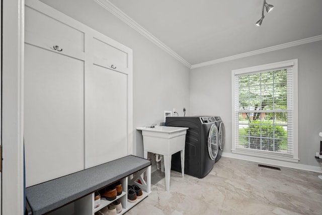 1002 Sunset Ave, Murfreesboro, TN 37129 - laundry area featuring ornamental molding, washing machine and dryer, and marble finish floors