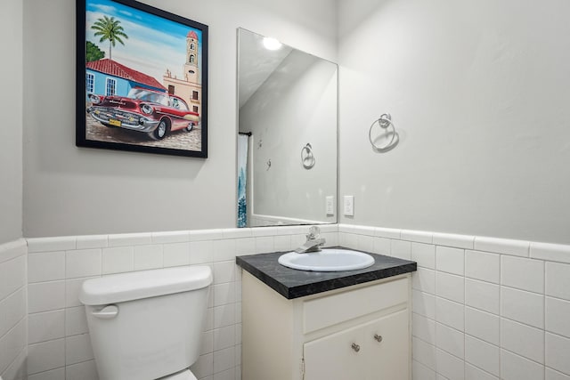 1002 Sunset Ave, Murfreesboro, TN 37129 - bathroom with tile walls, vanity, and wainscoting