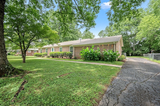 1002 Sunset Ave, Murfreesboro, TN 37129 - single story home with brick siding and driveway