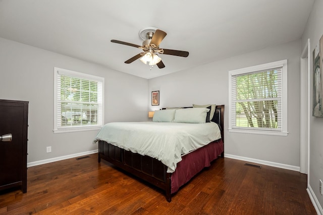 1002 Sunset Ave, Murfreesboro, TN 37129 - bedroom with multiple windows, wood finished floors, and a ceiling fan