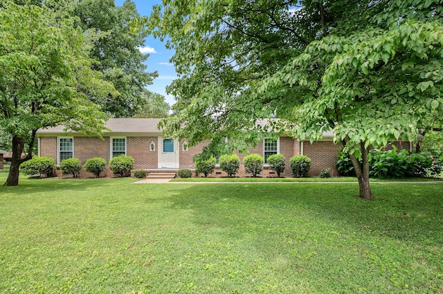 1002 Sunset Ave, Murfreesboro, TN 37129 - view of front of property with brick siding and a front yard