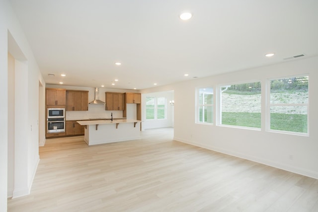 2359 Williamsport Lndg, Columbia, TN 38401 - unfurnished living room featuring light wood-type flooring and recessed lighting