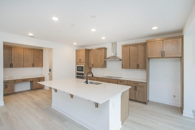 2359 Williamsport Lndg, Columbia, TN 38401 - kitchen featuring wall chimney exhaust hood, stainless steel oven, black electric stovetop, light wood-style floors, and recessed lighting