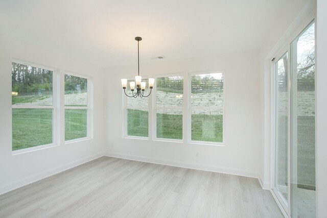 2359 Williamsport Lndg, Columbia, TN 38401 - unfurnished sunroom with wood finished floors and a chandelier