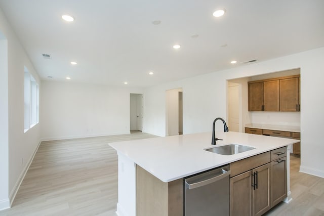 2359 Williamsport Lndg, Columbia, TN 38401 - kitchen with dishwasher, light wood-type flooring, light countertops, a center island with sink, and recessed lighting
