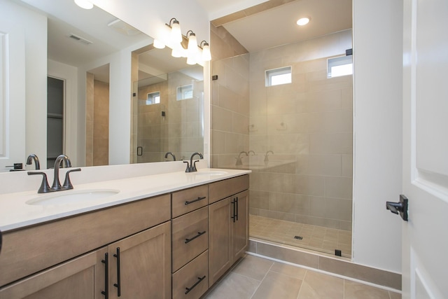 2359 Williamsport Lndg, Columbia, TN 38401 - bathroom featuring double vanity, tile patterned floors, tiled shower, and recessed lighting