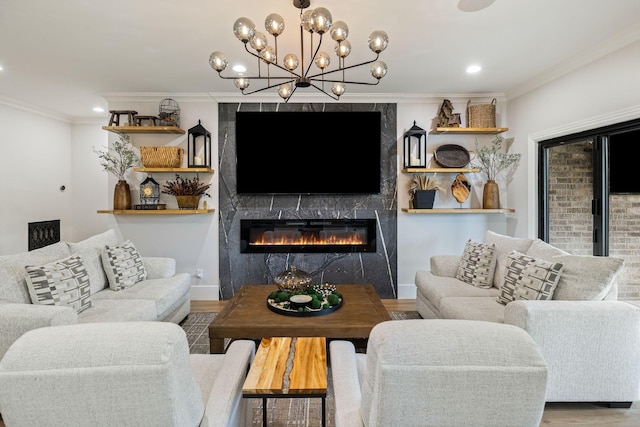 4024 Campania Strada, Spring Hill, TN 37174 - living room with ornamental molding, a fireplace, wood finished floors, recessed lighting, and a chandelier