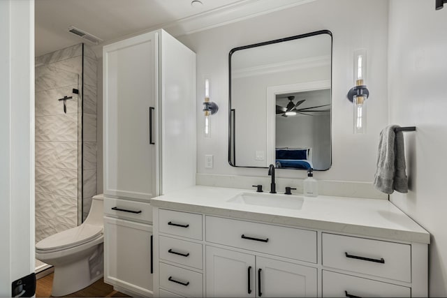 4024 Campania Strada, Spring Hill, TN 37174 - full bathroom with vanity, tiled shower, ornamental molding, a ceiling fan, and wood finished floors