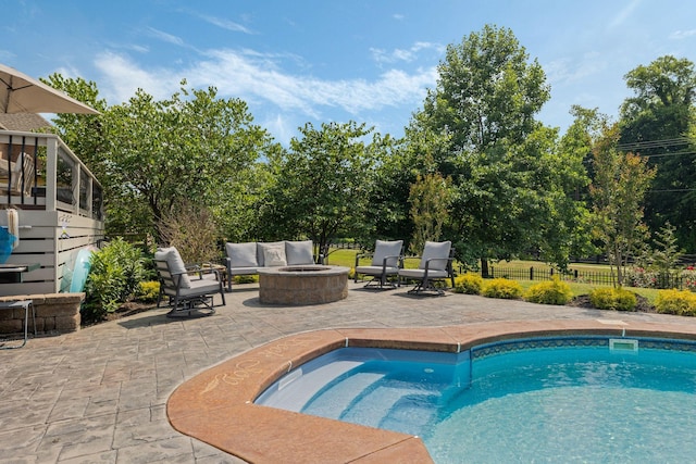 4024 Campania Strada, Spring Hill, TN 37174 - view of swimming pool featuring a patio and an outdoor living space with a fire pit