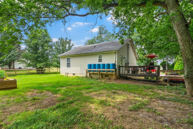 178 Miranda Rd, Cadiz, KY 42211 - rear view of house featuring a wooden deck, roof with shingles, crawl space, and a garden