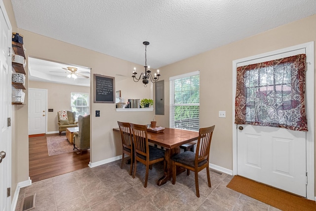 178 Miranda Rd, Cadiz, KY 42211 - dining space featuring plenty of natural light, electric panel, a chandelier, a textured ceiling, and a ceiling fan