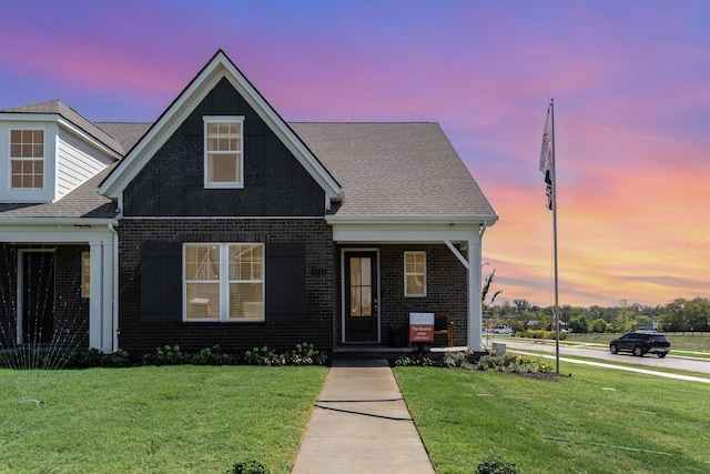 1234 Wrights Mill Rd, Spring Hill, TN 37174 - view of front of home featuring brick siding, a front yard, and a shingled roof