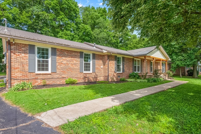 116 Skyview Dr, Columbia, TN 38401 - ranch-style house with brick siding, a front lawn, a metal roof, and covered porch