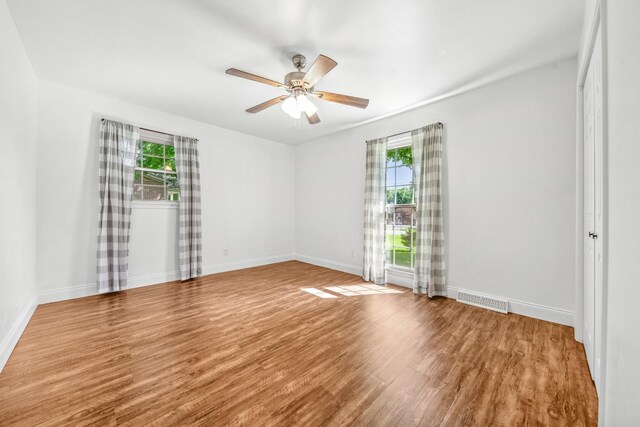 116 Skyview Dr, Columbia, TN 38401 - unfurnished room featuring healthy amount of natural light, wood finished floors, and ceiling fan