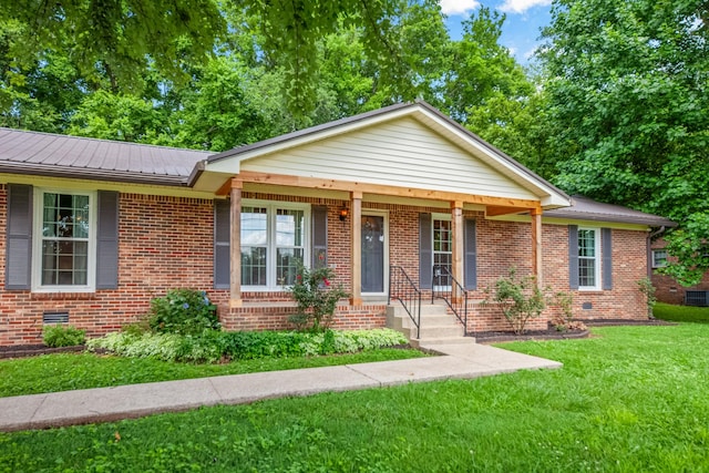 116 Skyview Dr, Columbia, TN 38401 - ranch-style home featuring brick siding, a front yard, a porch, and a metal roof