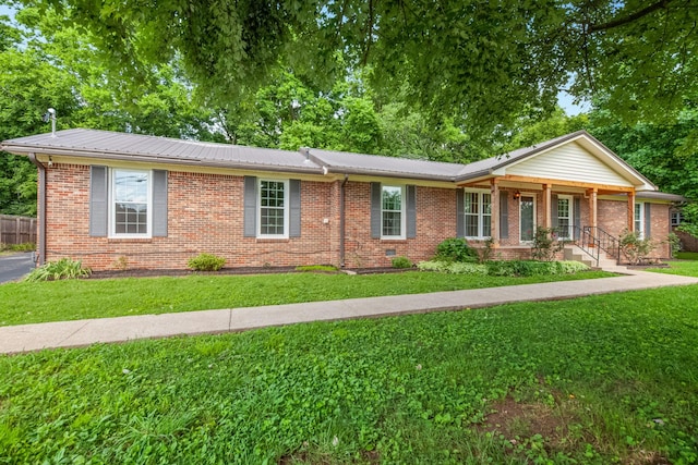 116 Skyview Dr, Columbia, TN 38401 - ranch-style home with brick siding, a metal roof, and a porch