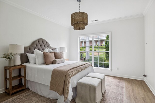 140 Ormesby Pl, Franklin, TN 37064 - bedroom featuring wood finished floors and crown molding