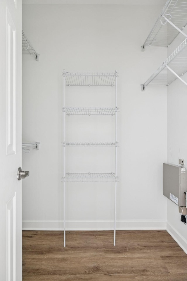140 Ormesby Pl, Franklin, TN 37064 - walk in closet featuring wood finished floors