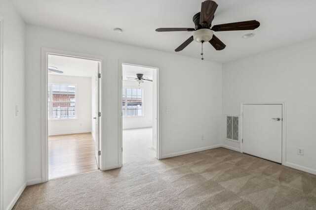 140 Ormesby Pl, Franklin, TN 37064 - empty room with carpet, ceiling fan, and a smoke detector