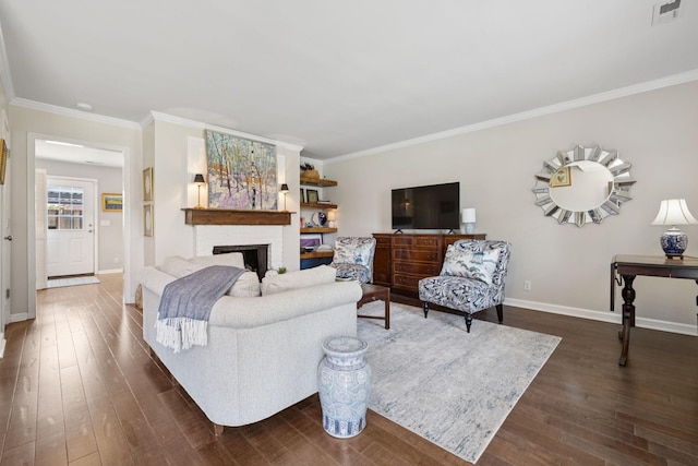 1013 E Northfield Blvd, Murfreesboro, TN 37130 - living area with ornamental molding, a fireplace, and dark wood-type flooring
