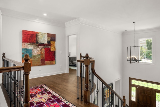 5605 Ottershaw Ct, Brentwood, TN 37027 - hallway with an upstairs landing, a chandelier, dark wood finished floors, crown molding, and recessed lighting