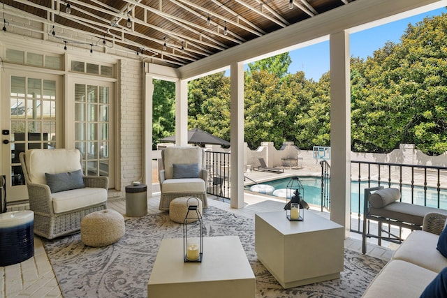 5605 Ottershaw Ct, Brentwood, TN 37027 - fenced backyard featuring a patio, outdoor lounge area, and view of wooded area