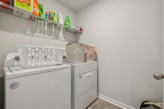 2410 Tate Farm Ln, White House, TN 37188 - washroom with separate washer and dryer and baseboards