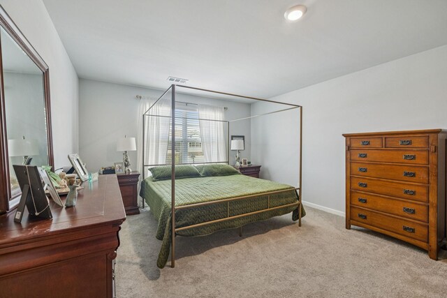 2410 Tate Farm Ln, White House, TN 37188 - carpeted bedroom featuring baseboards